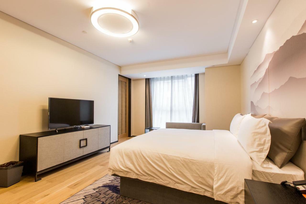 Howard Johnson By Wyndham Life Zhuoyuan Ningbo Extérieur photo