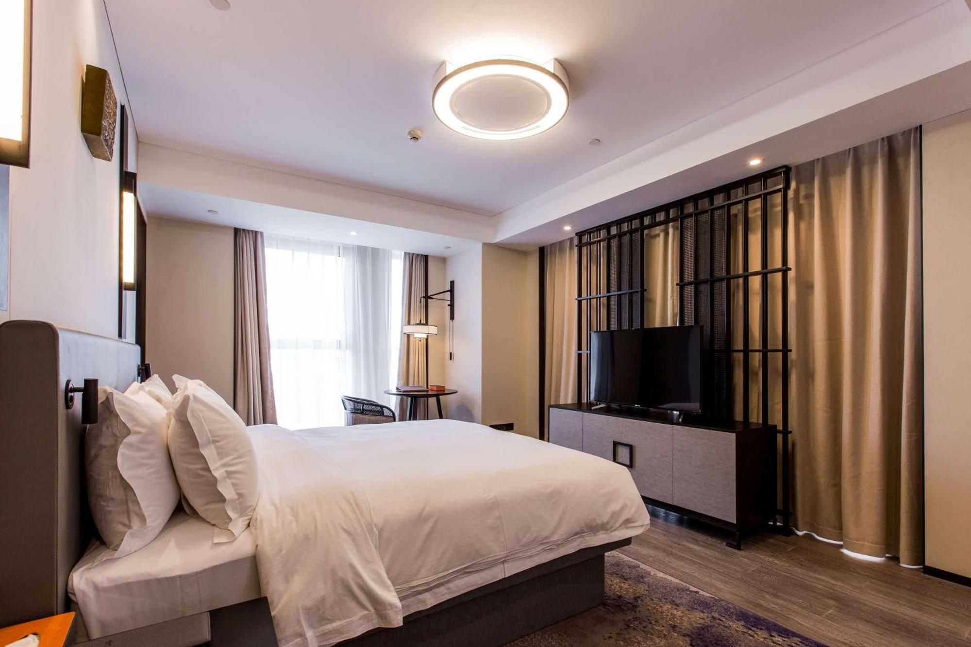 Howard Johnson By Wyndham Life Zhuoyuan Ningbo Extérieur photo